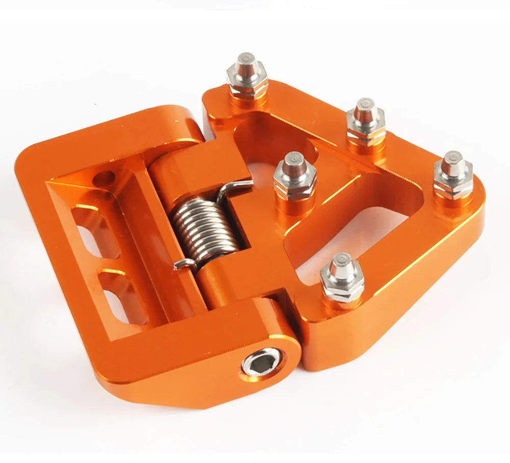 Pedal de freno trasero plegable